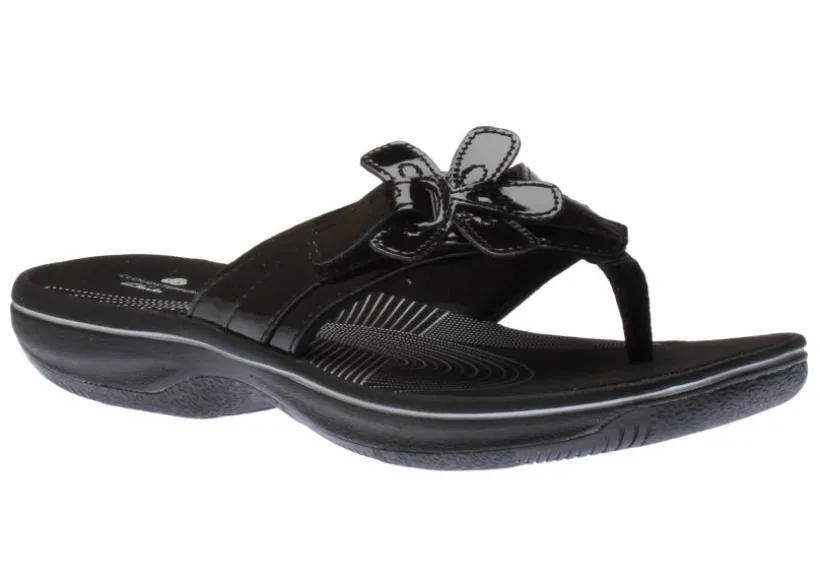 brinkley_flora_black_pate_0.webp Brinkley Flora Black Patent Thong Sandal